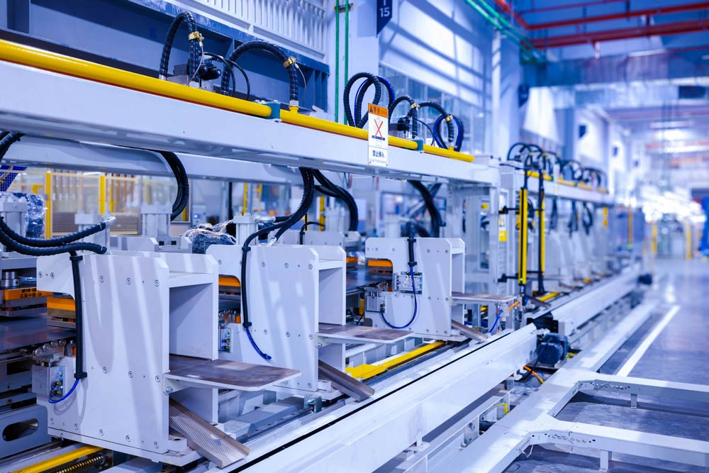 Automated production line in a factory setting with robotic arms and conveyor belts 2