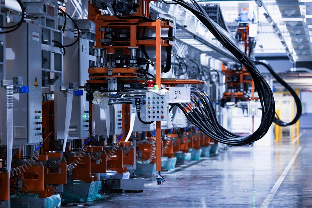 Automated production line in a factory setting with robotic arms and conveyor belts 3 